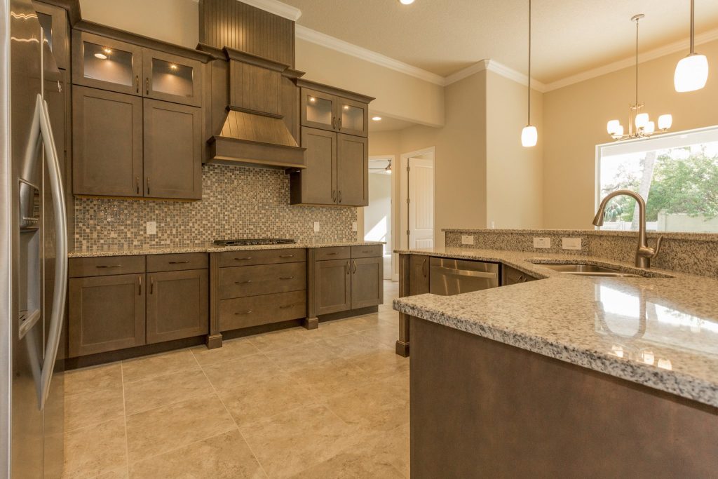 new kitchen cabinets and granite countertops in Melbourne FL by Hammond Kitchens & Bath