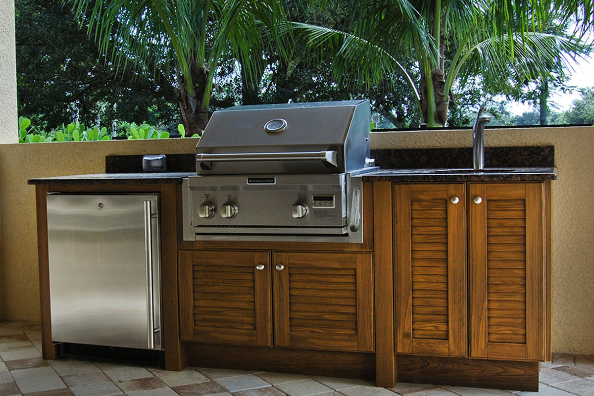 NatureKast outdoor summer kitchen cabinets in Melbourne FL. Cabinet installation by Hammand Kitchens & Bath