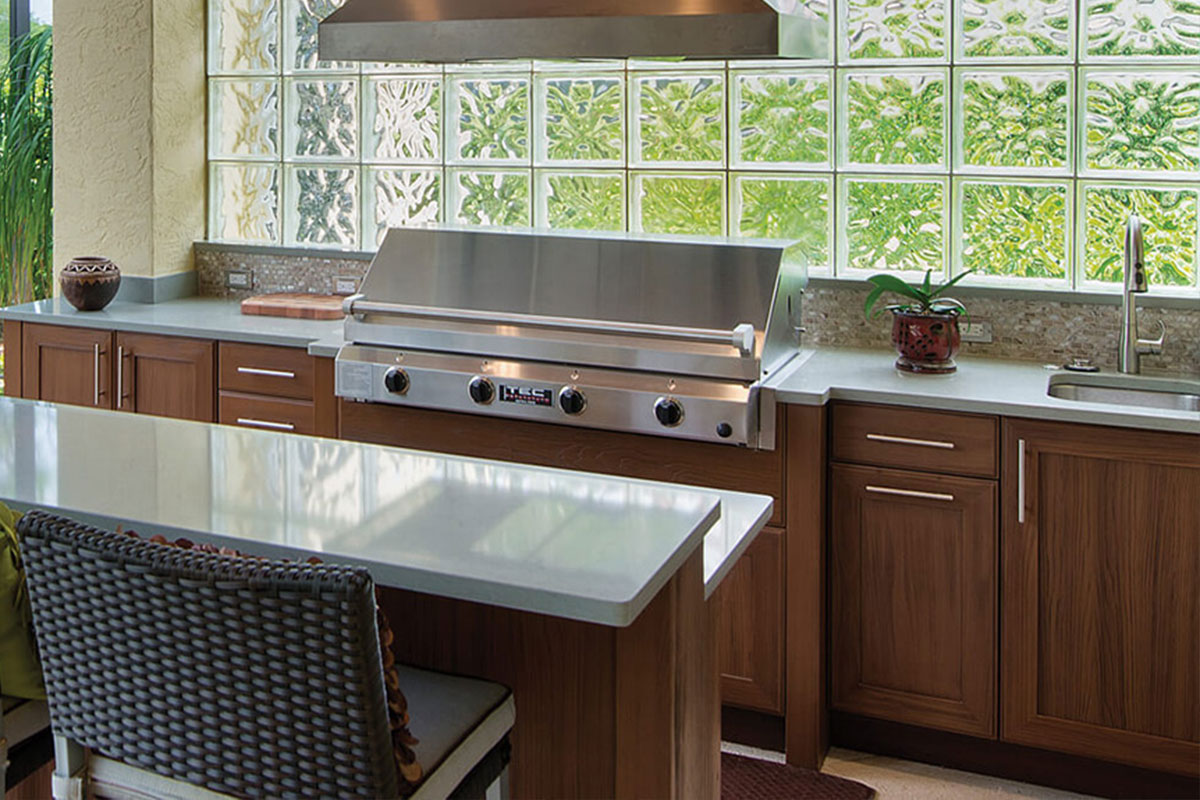 NatureKast outdoor summer kitchen cabinets in Melbourne FL. Cabinet installation by Hammand Kitchens & Bath