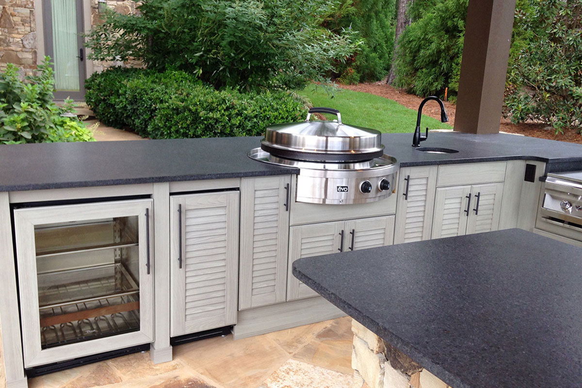 NatureKast outdoor summer kitchen cabinets in Melbourne FL. Cabinet installation by Hammand Kitchens & Bath